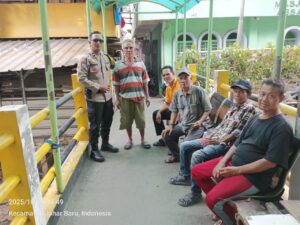 Cooling System dan Sambang Warga, Bhabinkamtibmas Kampung Rawa Perkuat Deteksi Dini Gangguan Kamtibmas