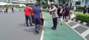 Personel Patmor Menteng Pantau Keamanan CFD Bundaran HI, Imbau Warga Waspadai Aksi Copet dan Jambret