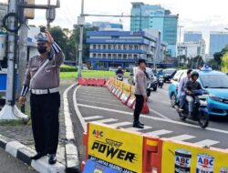 Kapolsubsektor Pegangsaan Pimpin Pengaturan Lalin Sore di Tugu Tani, Pastikan Arus Pulang Kantor Aman dan Lancar
