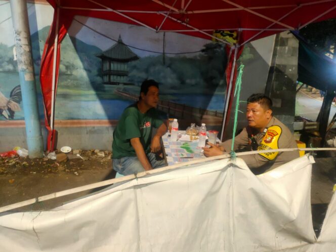 
					Kolaborasi Warga–Polisi Jaga Kalipasir Tetap Kondusif