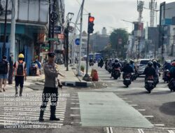 Pelayanan Lalu Lintas Pagi di TL Kesehatan, Arus Kendaraan Ramai Lancar