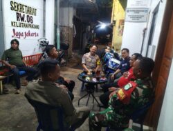 Jelang Pagi, Polisi Kawal Keamanan Lingkungan Utan Panjang Lewat Sambang Pos Kamling