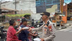 Polsek Koja Gelar Jumat Peduli, Bagikan Makanan Bergizi Gratis untuk Warga