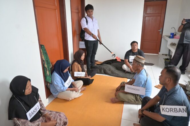 
					Satreskrim Polres Labusel Gelar Rekonstruksi Kasus Tewasnya Wanri Tambak di Hutagodang, Tersangka Peragakan 17 Adegan