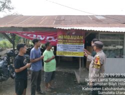 Kapolsek Bilah Hilir AKP Armen Faisal Perkuat Gerakan Anti Narkoba Lewat Pemasangan Spanduk Himbauan