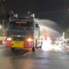 Brimob Polda Metro Jaya Semprot Jalan dan Bagikan Masker Antisipasi Abu Vulkanik Anak Krakatau